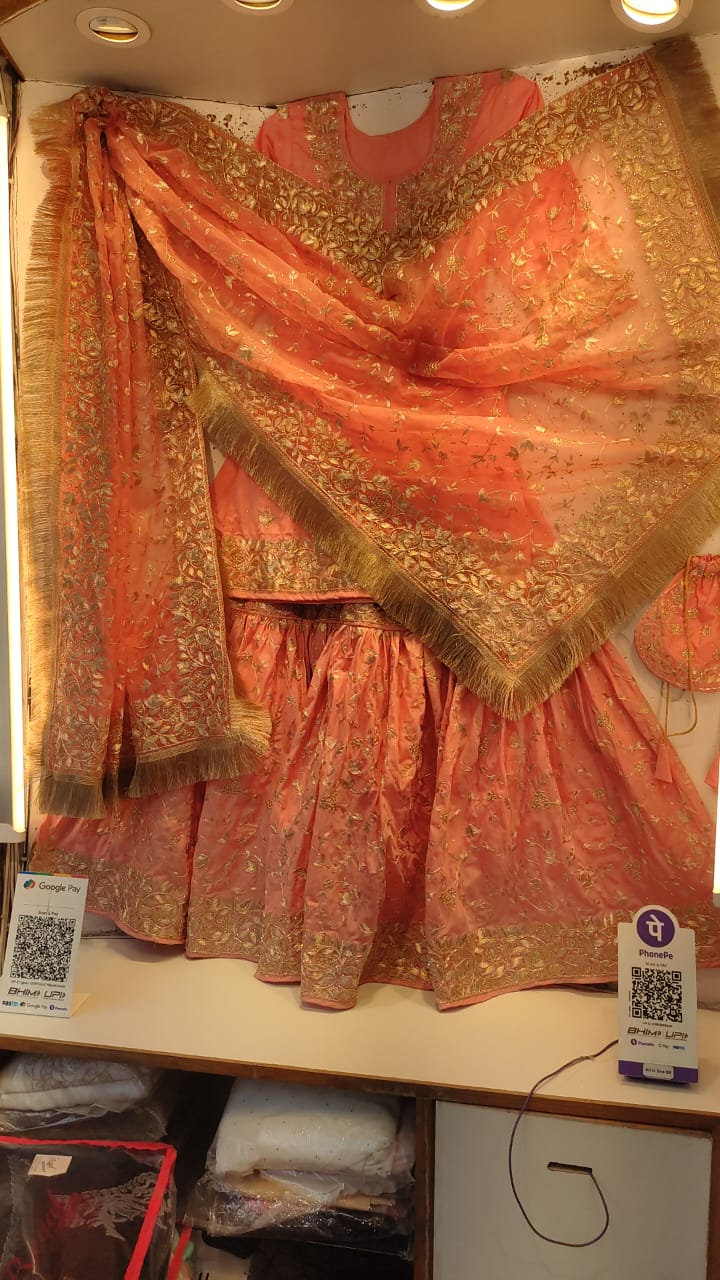 Coral hand embroidered lehenga